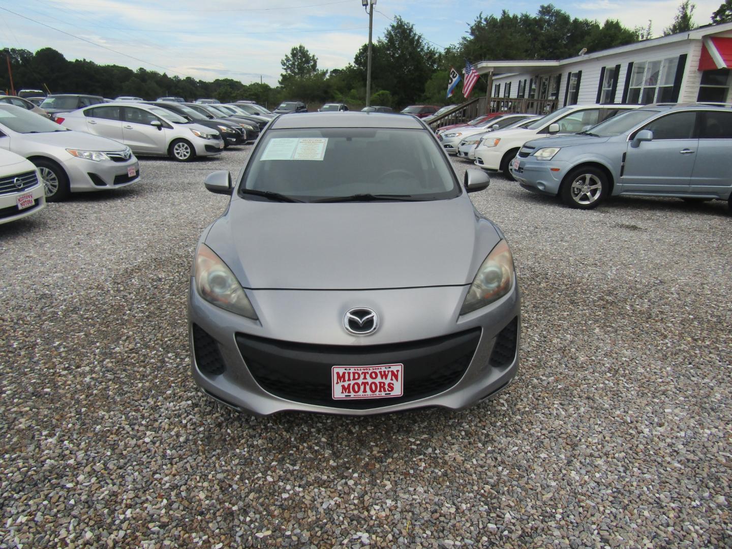 2012 Silver /Gray Mazda MAZDA3 (JM1BL1L77C1) , located at 15016 S Hwy 231, Midland City, AL, 36350, (334) 983-3001, 31.306210, -85.495277 - Photo#1